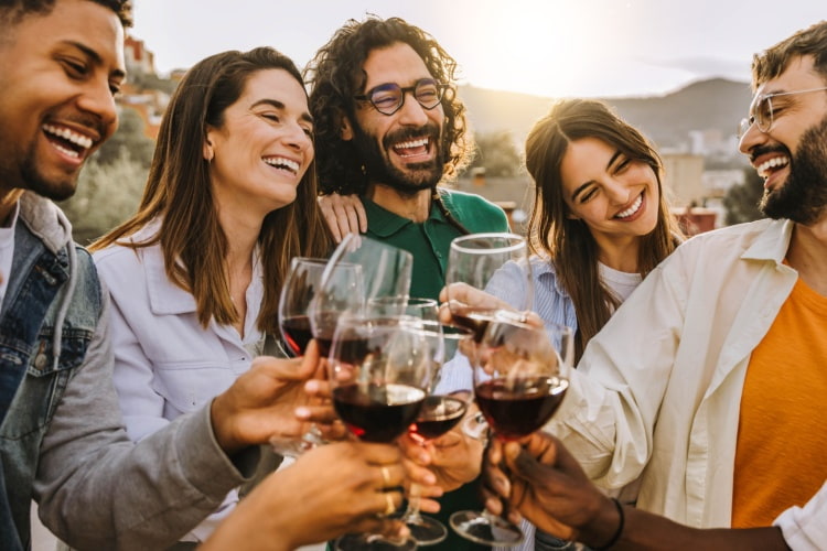 a group of friends enjoy a wine tasting together